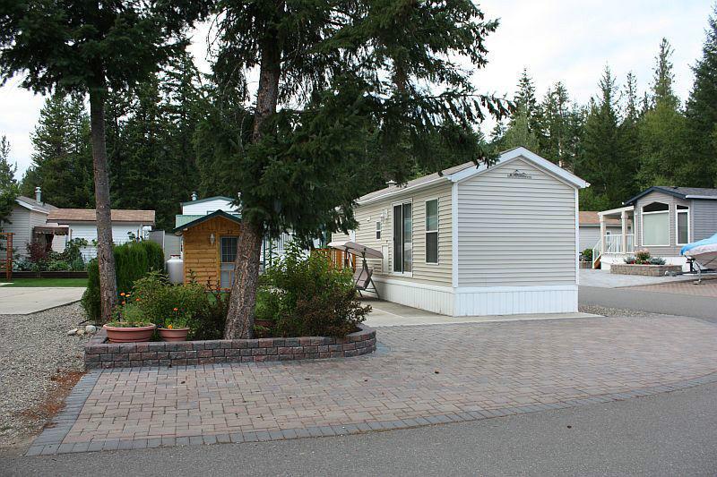 Modular home, log cabin guest house, shed and lot for sale