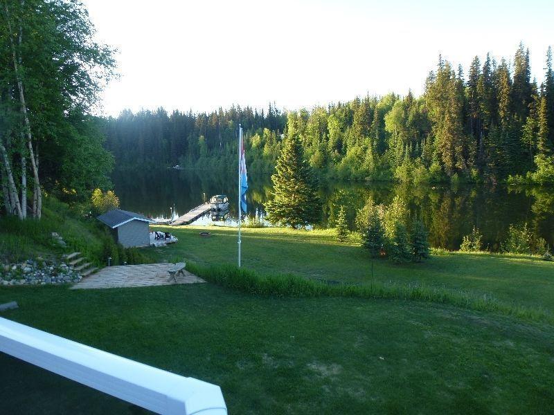 Fantastic Lake House with acerage in private bay on Ness Lake