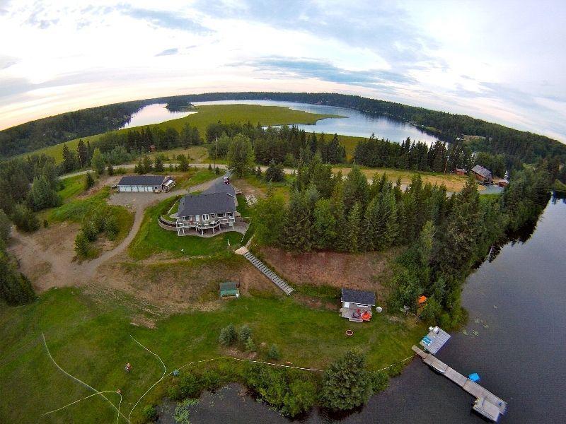 Fantastic Lake House with acerage in private bay on Ness Lake