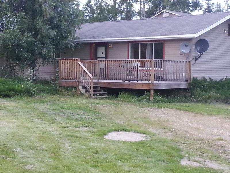 rancher on 5 acres easy access to FSJ