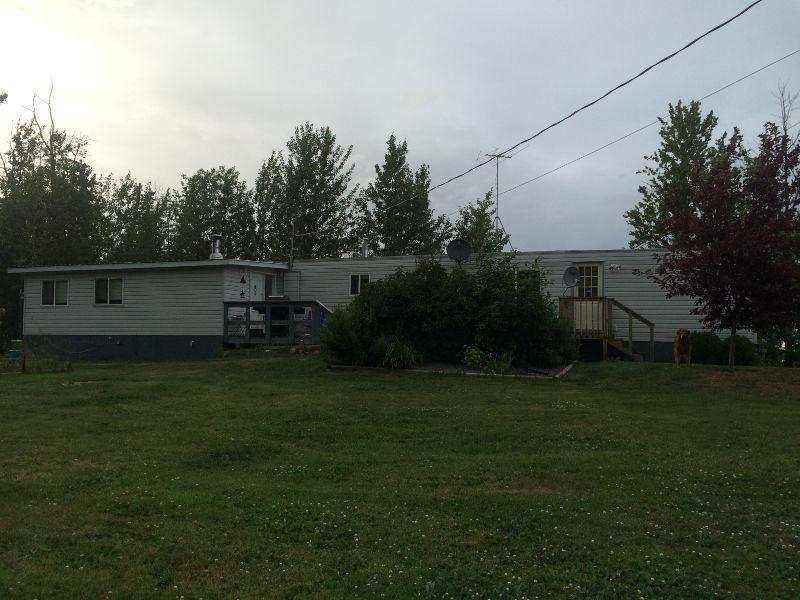 Trailer and garage on 5 acres for rent, 10 min east of Chetwynd