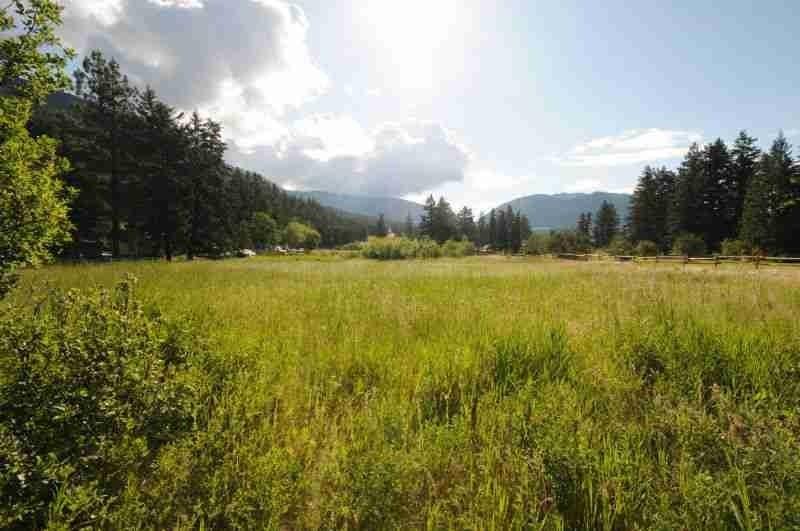 Rare parklike acreage with creek and nearby fishing lakes