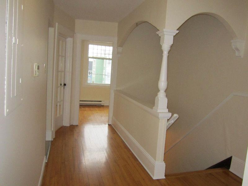 Two-bedroom with sunroom-upstairs, sunny apartment