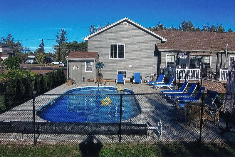 EXCELLENT HOME THAT FEELS LIKE AN OASSIS BACK YARD POOL &MORE
