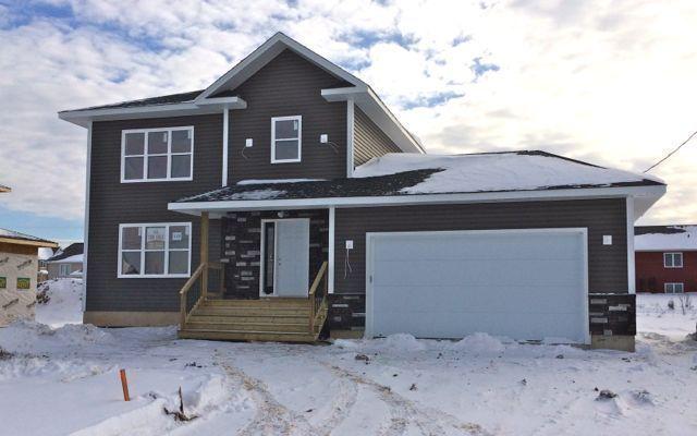 New two story family home w/ Garage in Grove Hamlet !