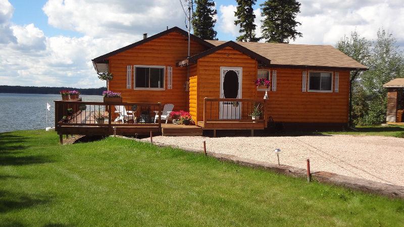 Picture perfect waterfront cottage on beautiful Setting Lake!