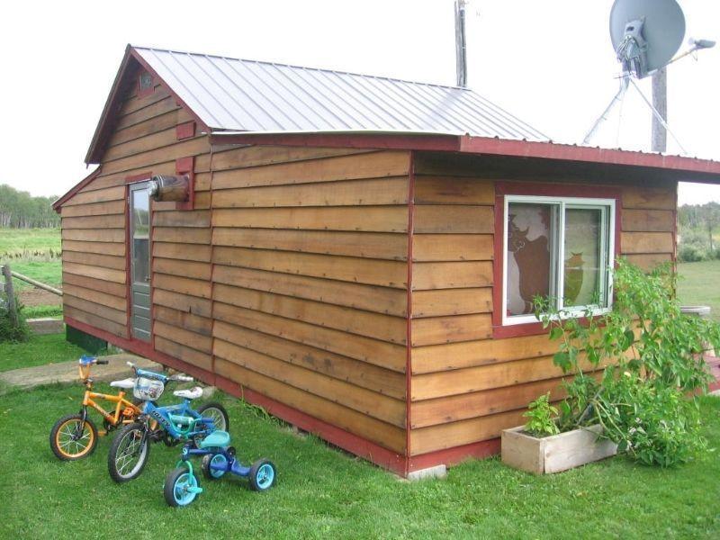 Quarter section with winterized cabin and outbuildings