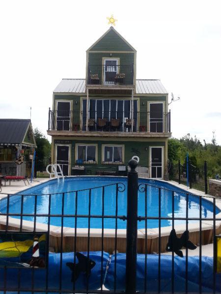VACATION RENTAL -EXTREME UNIQUE 3 STOREY POOL HOUSE
