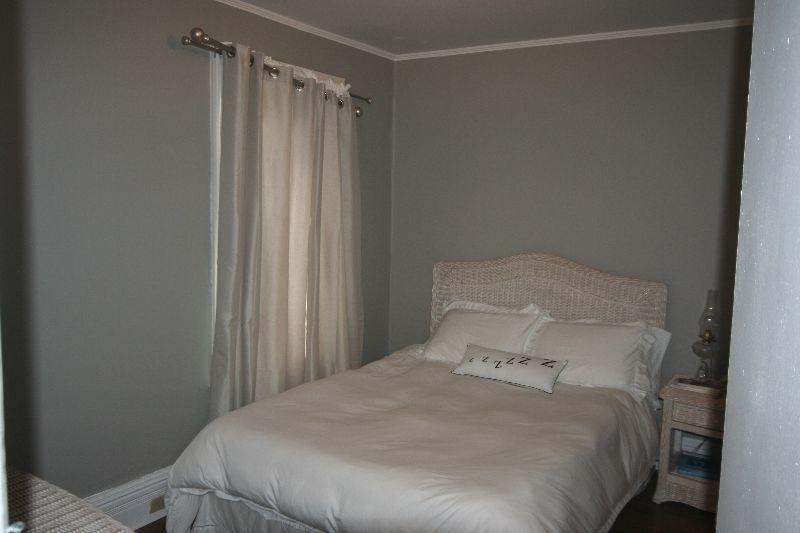 Walk to Queens/ Hub Two bedroom parking and laundry