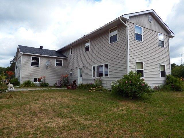 Large 2002 built home with 42 ac and shop. Close to lake