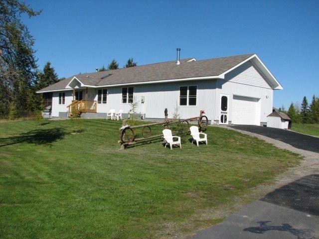 Large 2003 built home. 2 bdrm full inlaw. 100 acs. River