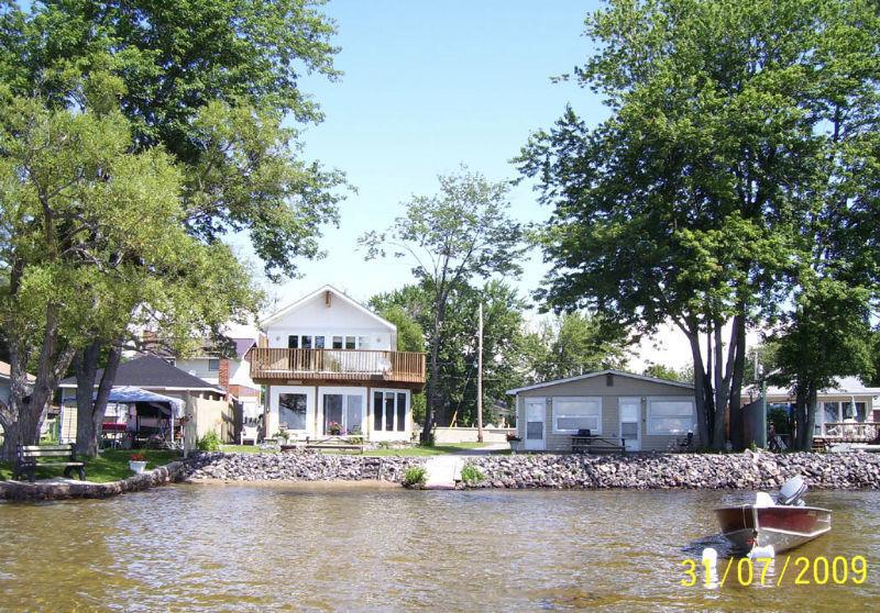 Excellent income 63' sandy beach on lake Nipissing in