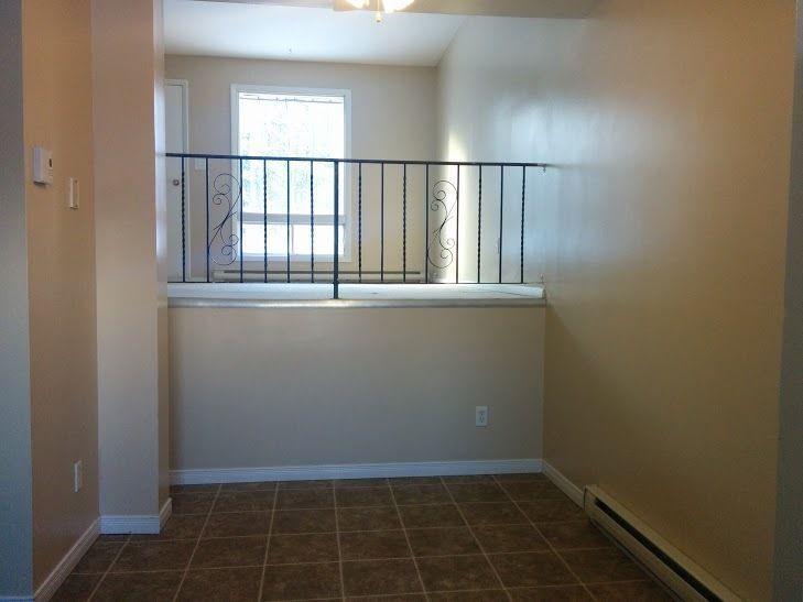 Warm 3 Bedroom Townhouse with Parking + 1 Month Free