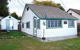 Cute and Classic Waterfront Cottage - McIntee Real Estate