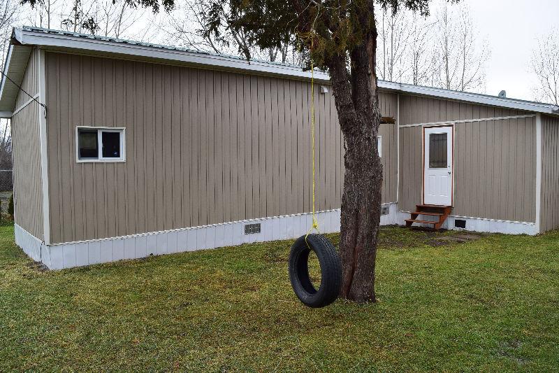 Mobile home with lots of potential!