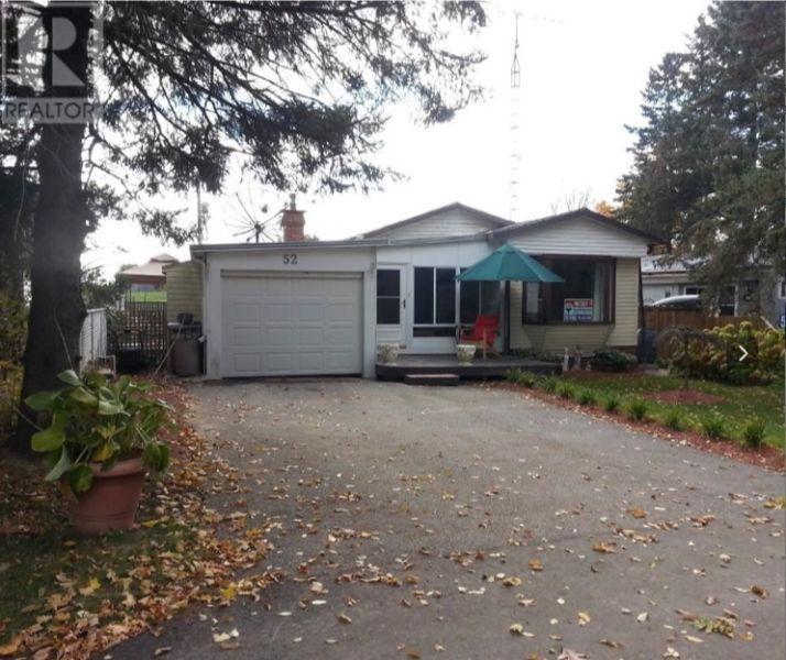 home for sale with 3 bedrooms/Garage/Workshop& Sunroom