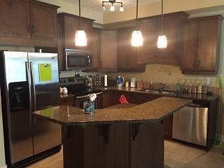 Executive Fully Furnished1 Bedroom + Den Condo - Across from TRU