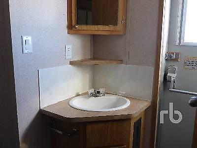 small suite full bathroom kitchen couch