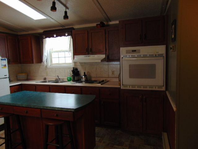 MINI HOME JUST LISTED! PRICED BELOW ASSESSED VALUE $44,500