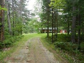 WATERFRONT LOT WITH COTTAGE ON SALMON RIVER, EAST OF CHIPMAN, NB