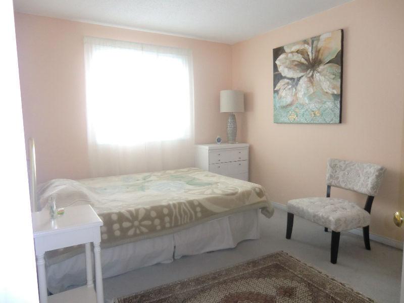A furnished bedroom-for female student south end