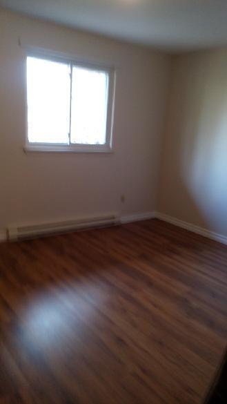 BRIGHT ONE or TWO BEDROOM IN SMALL 9 PLEX