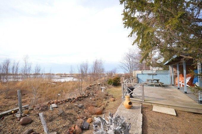 AFFORDABLE, YEAR ROUND LAKEFRONT HOME/COTTAGE-9677 LAKE RD