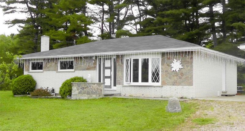 Classic White Brick 3-Bedroom Home on 3.5 Acres in French River
