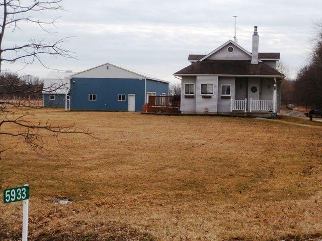 APPROX. 12.8 ACRES WITH HOME, BARN, OUTBUILDING, POND & BUSH