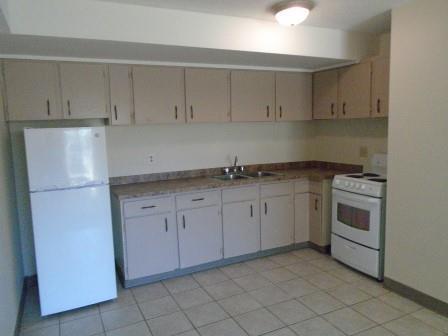 One Bedroom South Side Walk-out, Near College - ALL INCLUSIVE !!