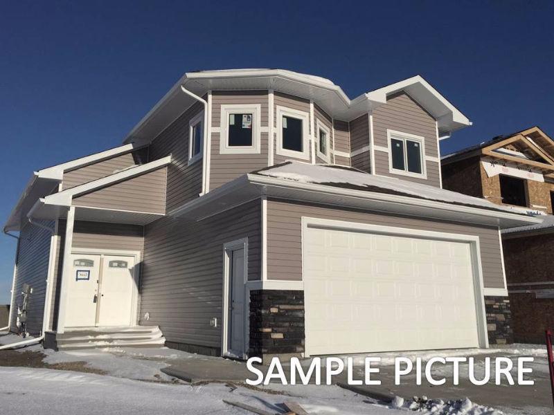 MODIFIED BI-LEVEL WITH TRIPLE CAR FINISHED GARAGE IN COPPERWOOD!