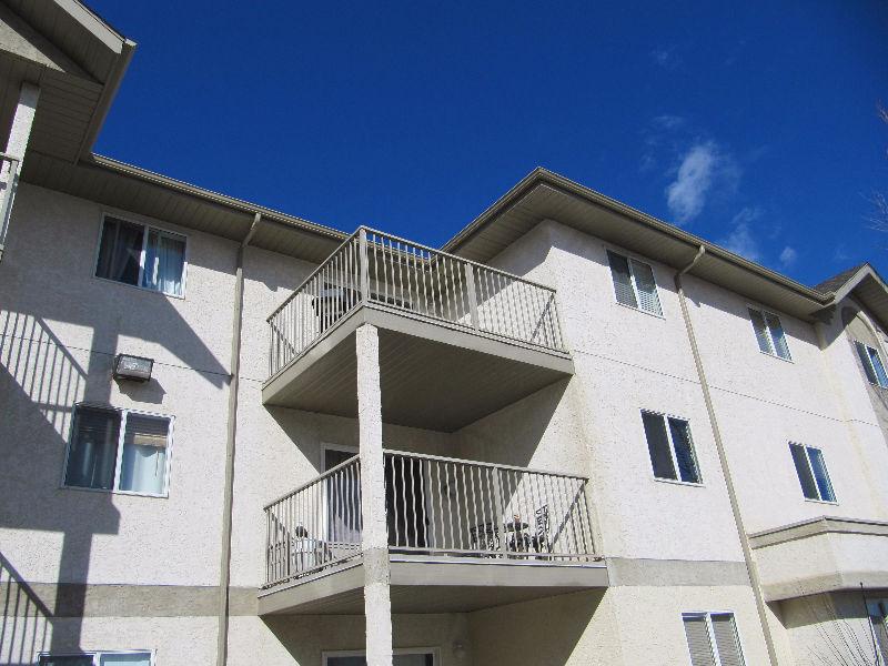Top Floor Condo with Large Balcony