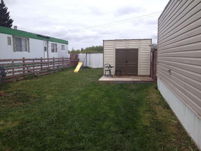 Updated mobile home with huge yard and FULL ENSUITE