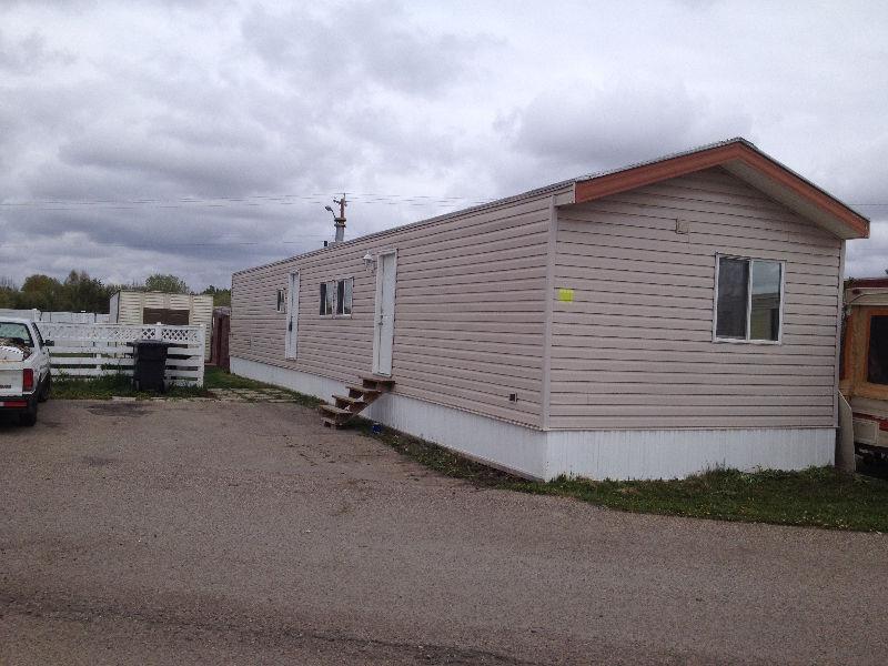 Updated mobile home with huge yard and FULL ENSUITE