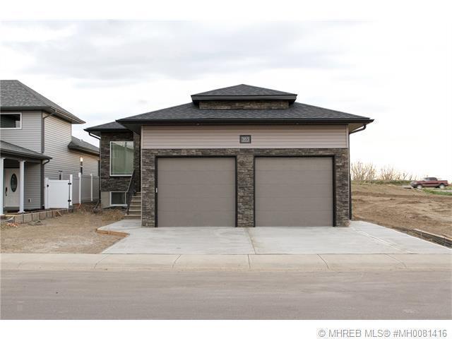 BEAUTIFUL,QUALITY BUILT BUNGALOW BY SCHMIDT CONTRACTING