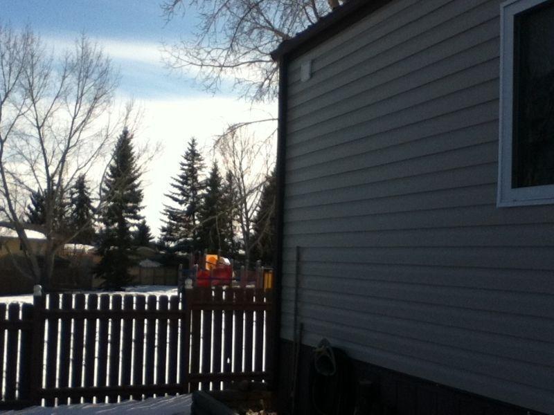 modular on residential street in Lacombe