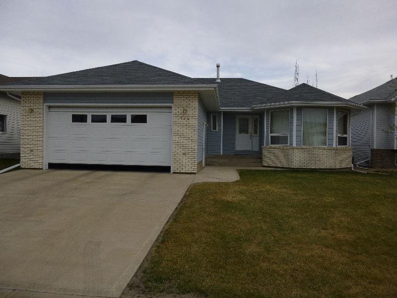 ONLY $439,500 FOR THIS SPACIOUS COZY BUNGALOW IN
