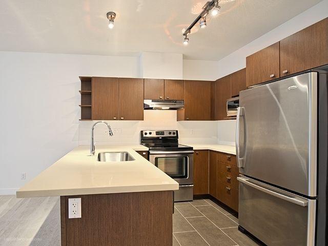 Large 1 bedroom & den suite with oversized patio (parking incl.)