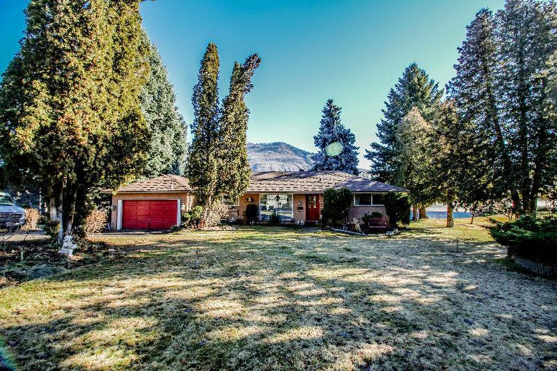 Riverfront Home on Nearly 1/2 Acre w/ River and Mountain Views