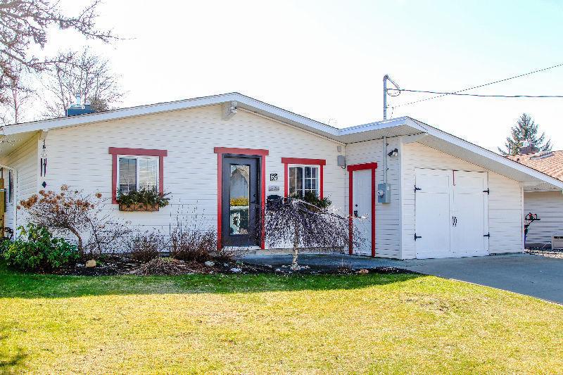 Tastefully renovated bungalow with gorgeous back yard!