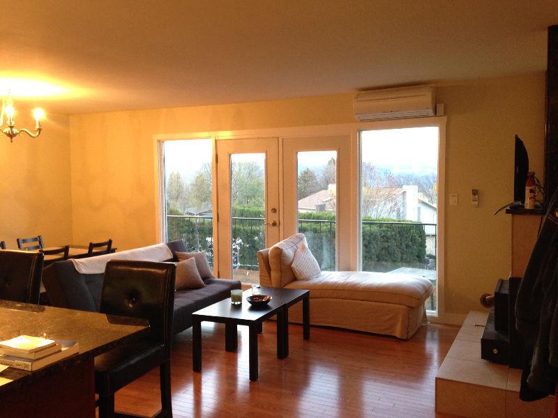 RENOVATED - MAIN FLOOR ON MCGILL, WALK TO TRU, SHOPPING, BANK