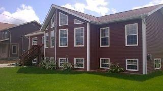 New Listing! Chalet style 4 bdrm with 1 bdrm apt! $329,900