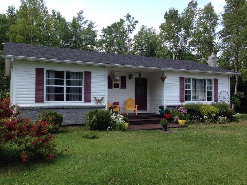 Beautiful Home in Park-like Setting on edge of GFW!