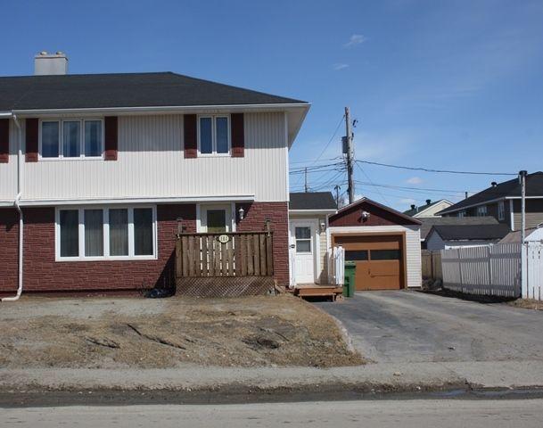 NEW LISTING! 101 CARTIER AVENUE.. 3 BEDROOM HOME WITH GARAGE!