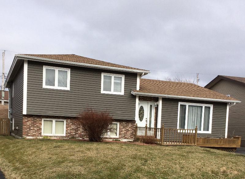 Spacious home close to schools in Mount Pearl, agents welcome