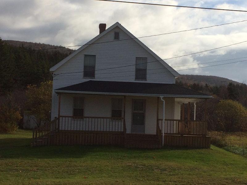 4 bedroom home close to Margaree River with lots of potential