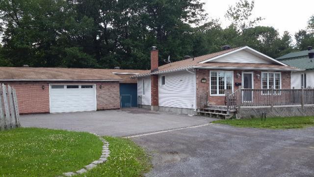 Custom Built 2 Bed, 2 Bath bungalow with detached triple garage!