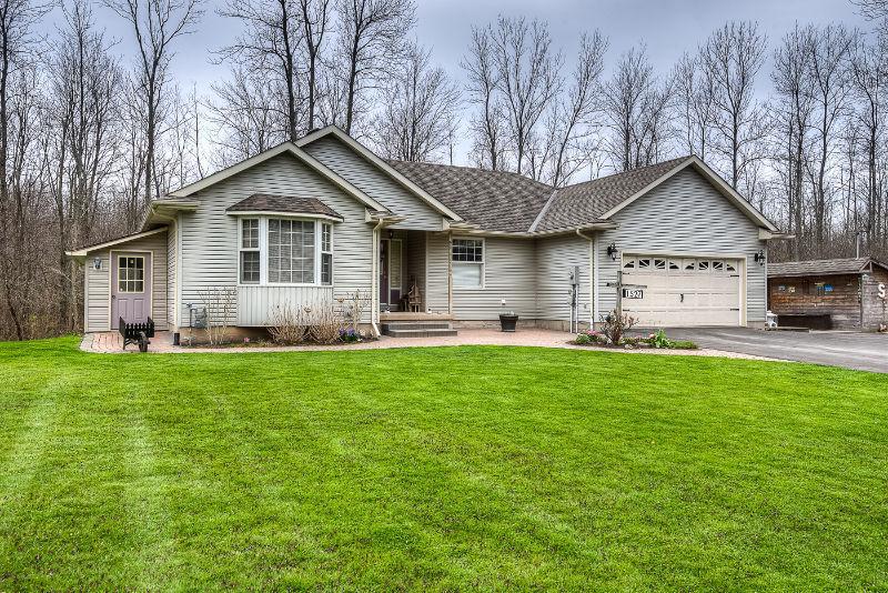 BUNGALOW on nearly 2 ACRES with HEATED SHOP