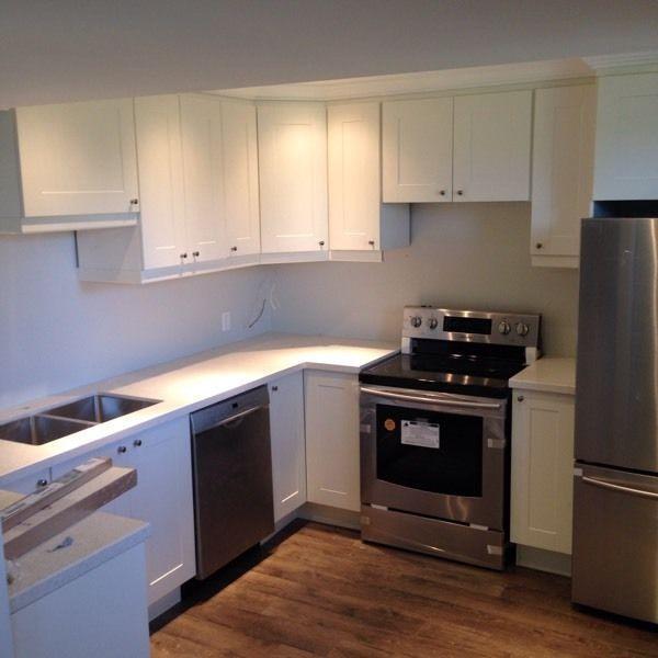 Brand new 2 bdrm separate entry ensuite laundry bright sunny