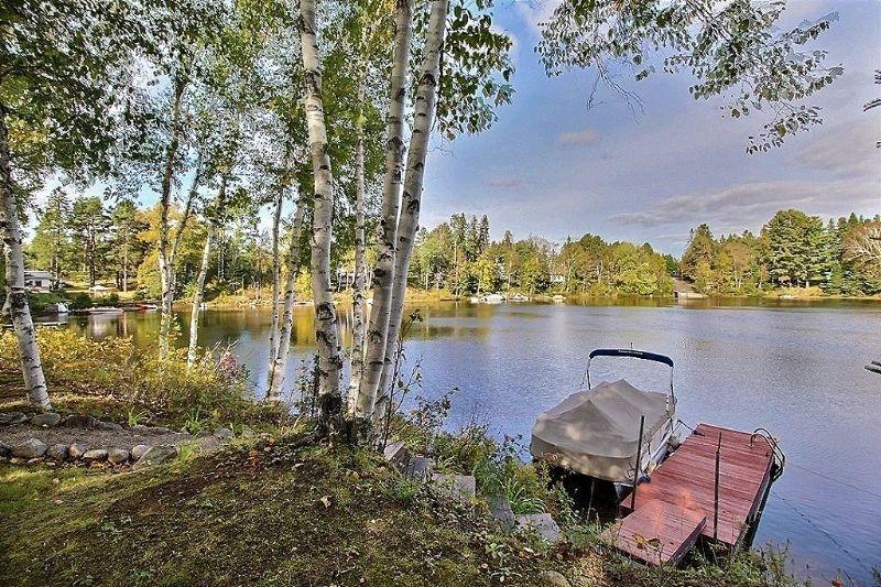 MAISON OU CHALET SUR BORD DE LAC NAVIGABLE